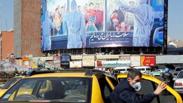 Authorities in Iran along with critics say the sanctions are hindering the government’s effort to face the crisis.